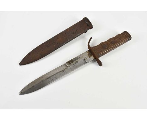 ITALIAN BLACKSHIRTS; a WWII dagger and scabbard marked 'MVSN', the wooden handle of the dagger with carved Roman eagle, inscr