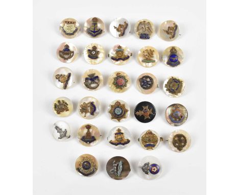 A collection of twenty-eight military badges, many with mother of pearl backing, including Canadian Artillery, RASC, Royal Ta