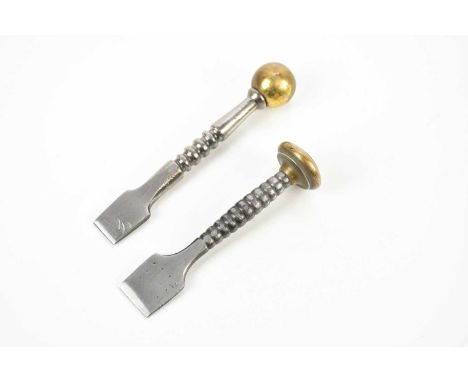 Two 18th century button hole cutters, largest 11cm (2).