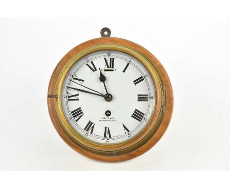 SMITHS CRICKLEWOOD; a brass bulkhead time piece, with enamel Roman numeral dial and winding hole to front and side, no key, d