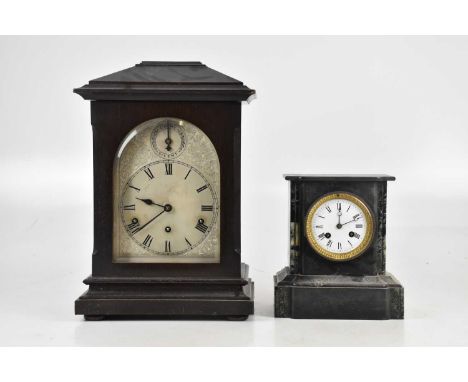 An early 20th century ebonised bracket clock, the silvered dial set with chime/silent mechanism, and a Victorian slate and ma