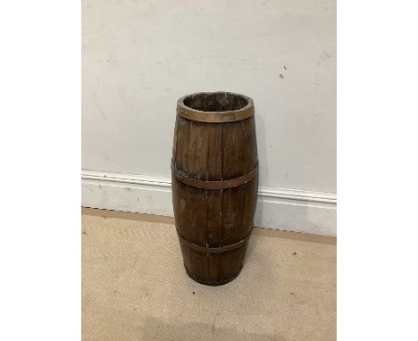 A coopered barrel stick stand, height 70cm.