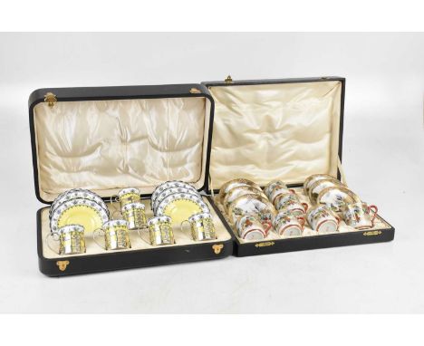 AYNSLEY; a cased six setting coffee service, with hallmarked silver holders, and a six setting Japanese coffee set (2).  Cond