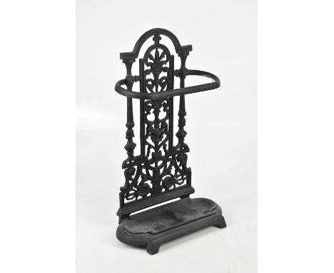 A Victorian style cast metal stick stand with pierced back, height 53cm.