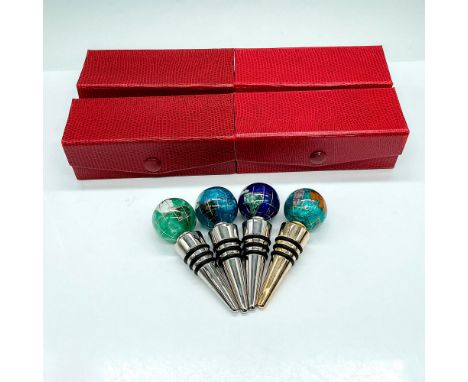 Elevate your wine collection with this set of four handcrafted gemstone globe wine stoppers. These items have their original 