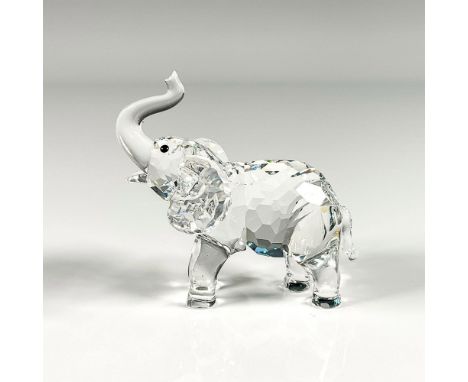 Lead crystal part of the Rare Encounters collection and is made with innocent jet crystal eyes with raised trunk and open mou