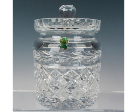 Clear crystal biscuit barrel decorated with crisscross and laurel designs. Waterford etched backstamp. This item has its orig
