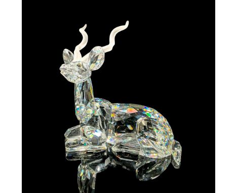 Brilliant cut crystal figure of a kudu, a type of antelope, lying down resting, with satin crystal horns. Part of the African