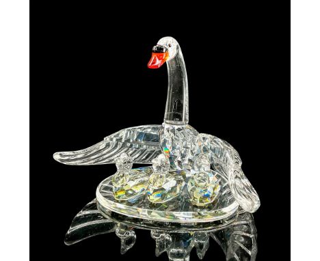 Sparkling clear crystal figure of mother swan and her little chicks below her. Part of the Mother and Child series. Swarovski