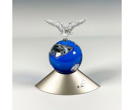 Designed to welcome the New Millennium 2000. The globe unites five stylized continents in the form of cut crystal inlays and 