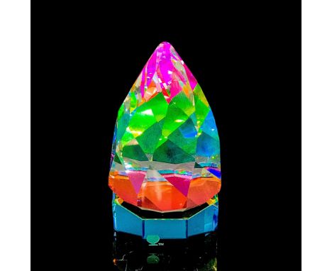 Decorative multi-colored pyramid paperweight. This item has a base included. Swarovski backstamp. Base dimensions are 2.25""W