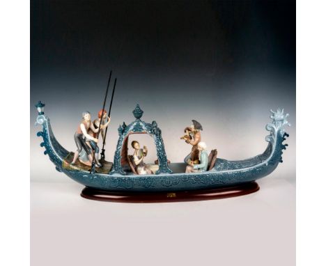 Limited edition glossy finish figural grouping. Lladro backstamp. Certificate of Authenticity included. This item has a base 