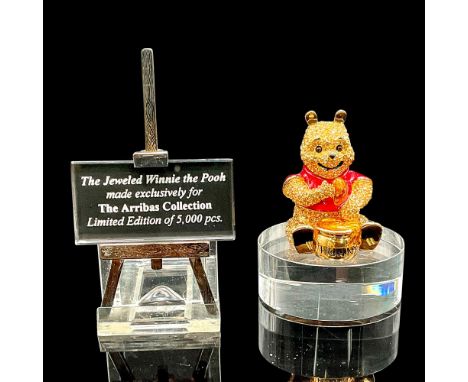Winnie the Pooh sits eating a bowl of honey covered in over 600 Swarovski Crystals. Included is a Swarovski plaque with its a