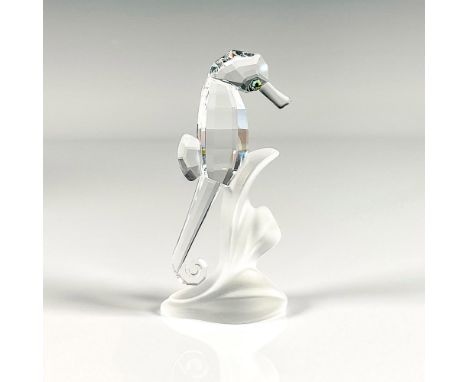 Part of the Aquatic Worlds collection and this sea beauty is attached to a frosted plant base. Swarovski etched backstamp. Th