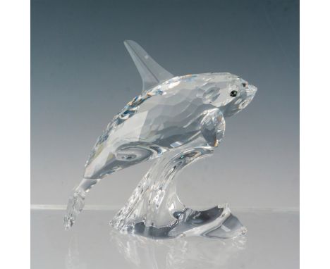 Lead crystal part of the South Sea collection and is made from clear crystal, represented riding a smooth wave. Swarovski etc