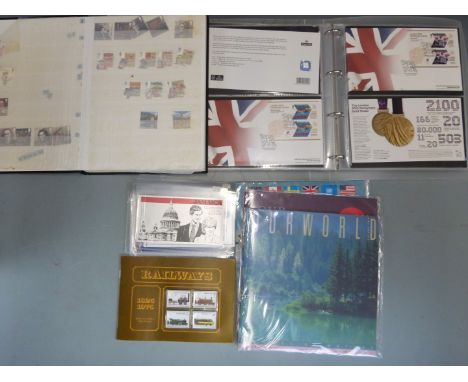 A quantity of empty albums, reference books and Olympic first day covers