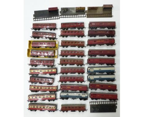 A collection of Tri-ang and Tri-ang Hornby 00 gauge model railway coaches including 18 LMS and various operating Royal Mail P