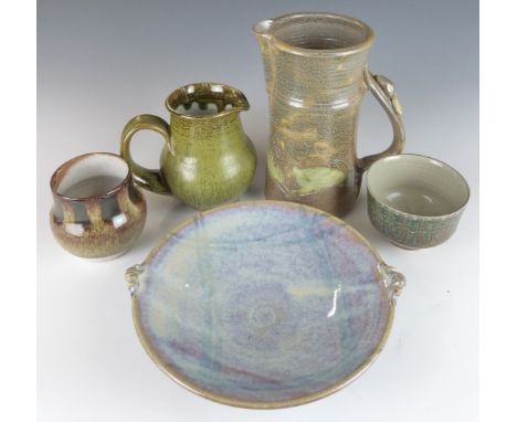 Five pieces of studio pottery including Ray Finch for Winchcombe and Hugh West pedestal dishes,&nbsp; jug with hare decoratio