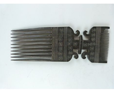 African tribal carved comb, Zanzibar probably first quarter 20thC, H26cm