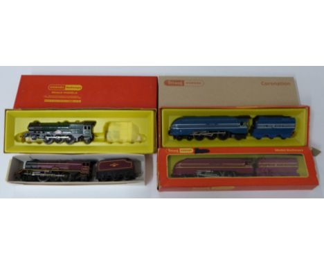 Four Tri-ang Hornby 00 gauge model railway LMS Coronation and Princess Class locomotives, all in boxes.&nbsp;