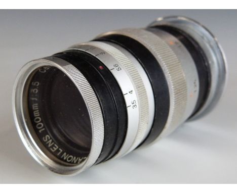 Canon 100mm f 3.5 camera lens with Leica type screw mount