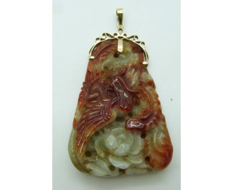 Chinese carved jade pendant depicting a dragon and phoenix, with 14k gold mount&nbsp;