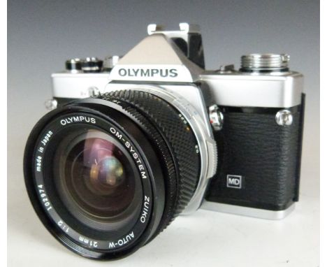 Olympus OM-1n SLR camera with 21mm 1:2 lens