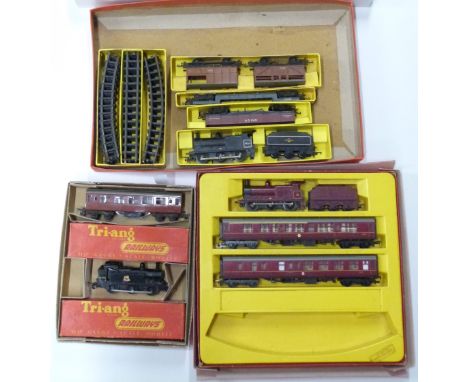 Three Tri-ang 00 gauge model railway train sets.&nbsp;