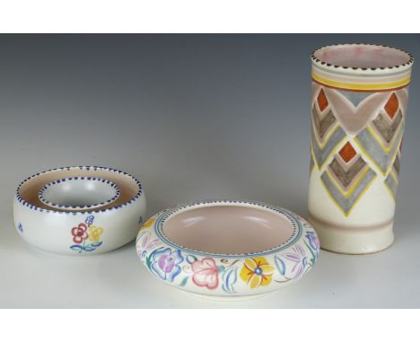 Three pieces of retro Poole pottery including a vase with geometric decoration, H17cm