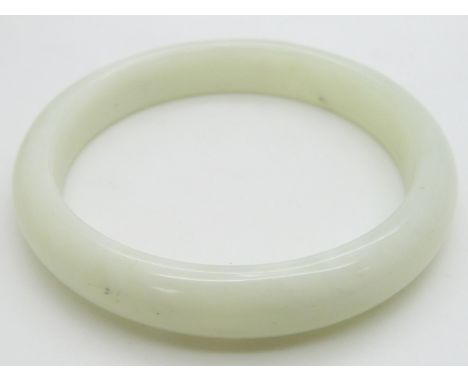 A 19thC Chinese mutton fat jade bangle&nbsp;