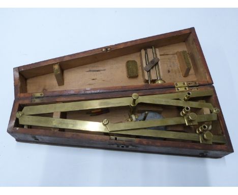 A 19thC brass draughtsman's or engineer's pantograph by W &amp; S Jones, 30 Holbn, London, in original fitted case with acces