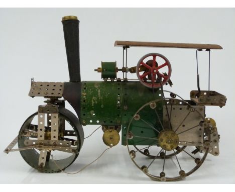 Meccano or Butcher &amp; Sons Primus model of a steam roller made using red, green and black parts, 43cm long.&nbsp;