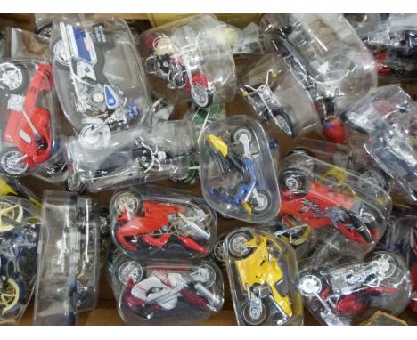 Thirty-five Maisto diecast model motorbikes including Yamaha, Kawasaki Ninja, Boston Police, Ducati etc, all in original pack