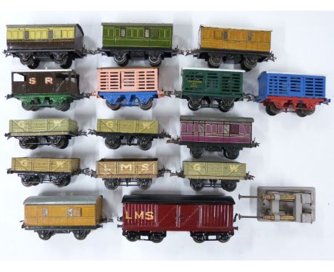 Fifteen Hornby 0 gauge model railway wagons and vans including SR, LMS, GW, MR, Southern 6T 2435 etc&nbsp;