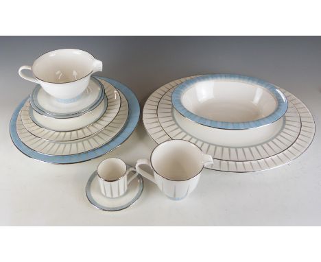 Approximately 63 pieces of Royal Worcester tea dinner ware decorated in the Linea pattern, includes&nbsp; two covered tureens