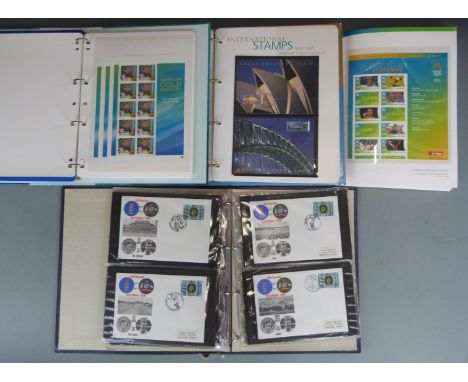 Sydney 2000 Olympic Games. Two Prestige stamp albums of gold medallist mini sheets and covers, an album of covers The Austral