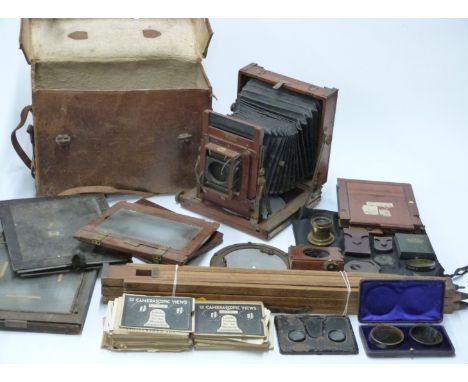 Houghton Victo plate camera with tripod, film holders, Thornton Pickard shutter, London Stereoscopic Co. lens, aperture plate