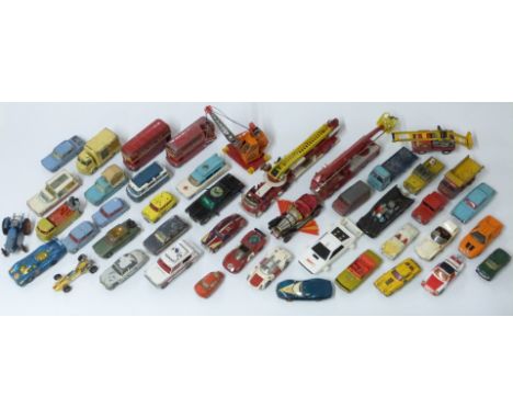 A collection of Matchbox diecast model vehicles including Thunderbirds, cars, construction vehicles etc, some in original box