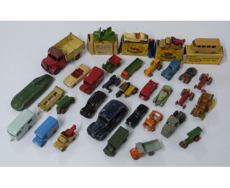 Thirty-three Matchbox Lesney 1-75, Dinky Toys, Charbens Miniature Series, Mobile Vehicle Series and similar diecast model veh