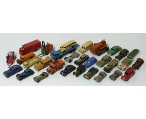 Thirty Dinky Toys diecast model vehicles including Foden Flatbed, military car, Auto Union racing car etc.&nbsp;