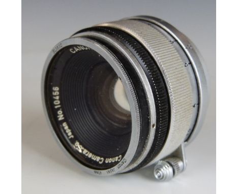 Canon 35mm f 1:1.8 camera lens with screw mount and Leica lens cap