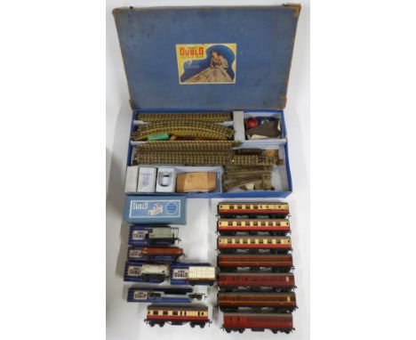 Fifteen Hornby Dublo 00 gauge model railway coaches, wagons, buildings and accessories including D1 Signal Cabin, Esso Petrol