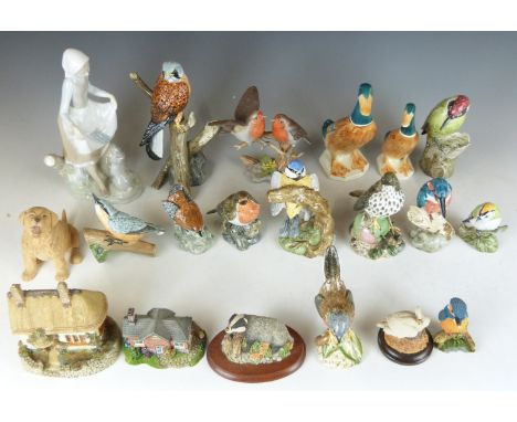 A large collection of ceramic figures including Lladro, Mack China birds, Beswick Ducks etc