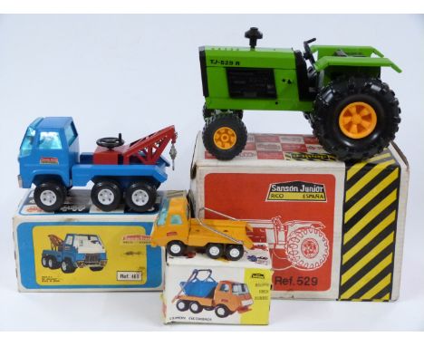 Three Sanson tinplate model vehicles Sanson Junior Tractor 529, Sanson Bravo Grua 460 and Sanson Mini Skip Lorry 560, all in 