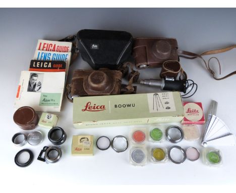 Leica camera accessories to include M3 to screw adaptor, 16469 converter, FIPOS in box, viewfinders, cases, BOOWU copier in b