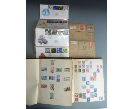 Two stamp albums of all world stamps mostly first half 20thC, two early first day covers for Newcastle NSW Australia 1937 and