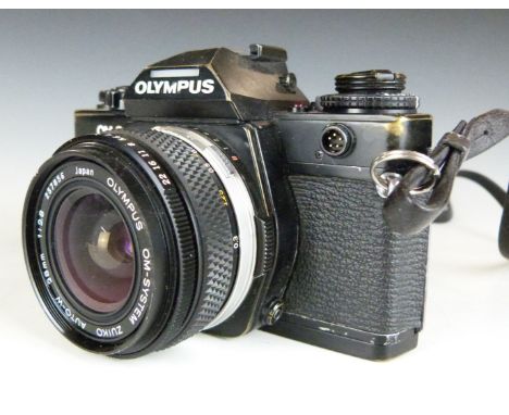 Olympus OM-3 SLR camera with 28mm 1:2.8 lens