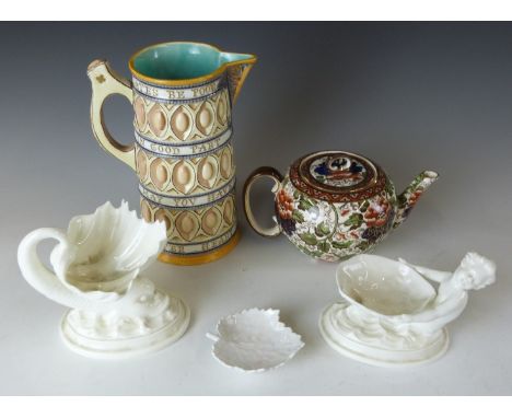 Wedgwood majolica motto jug, H19cm, two Royal Worcester figural sweetmeat dishes, Berlin pickle dish and a Royal Doulton faie