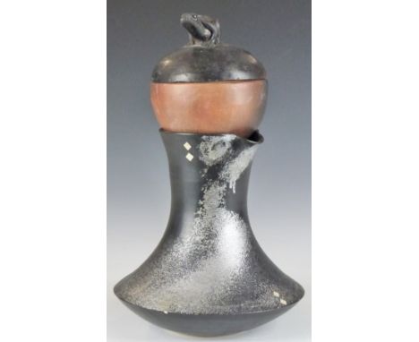 Studio pottery pedestal ewer with silvered glaze and diamond decoration, impressed MK, H19cm, covered pot with frog finial an