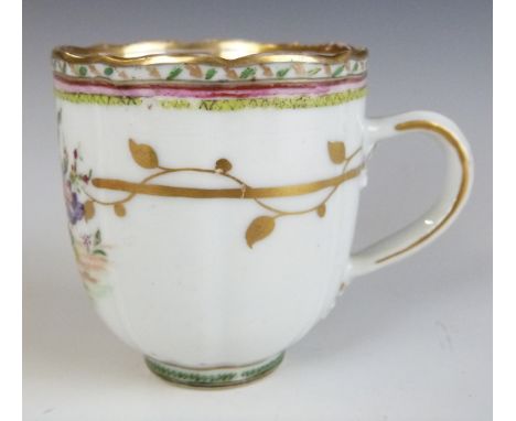 An 18thC Worcester first period coffee can with hand painted flower decoration, H6.3cm